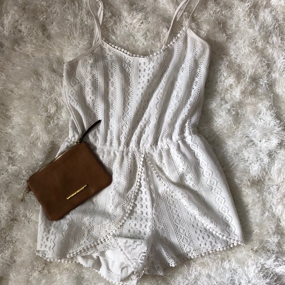 White romper with ruffled bottom